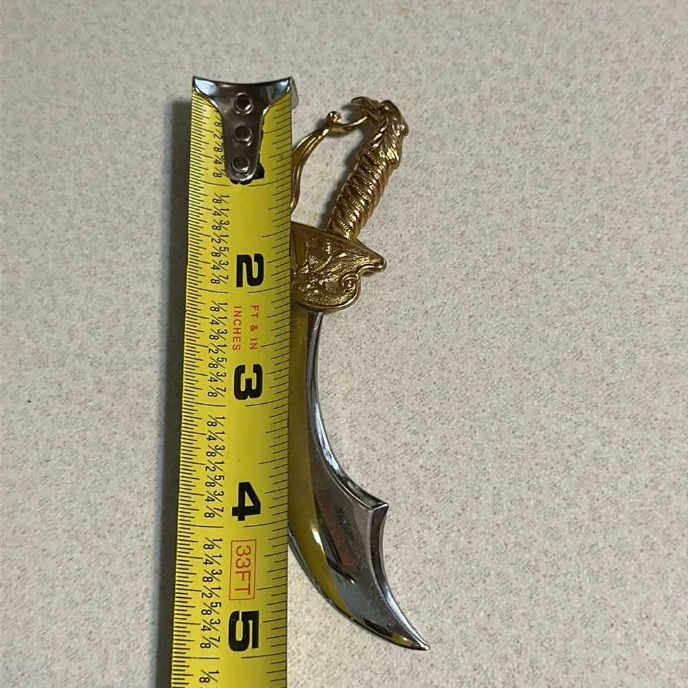Coro gold tone and silver tone sword broach (541)